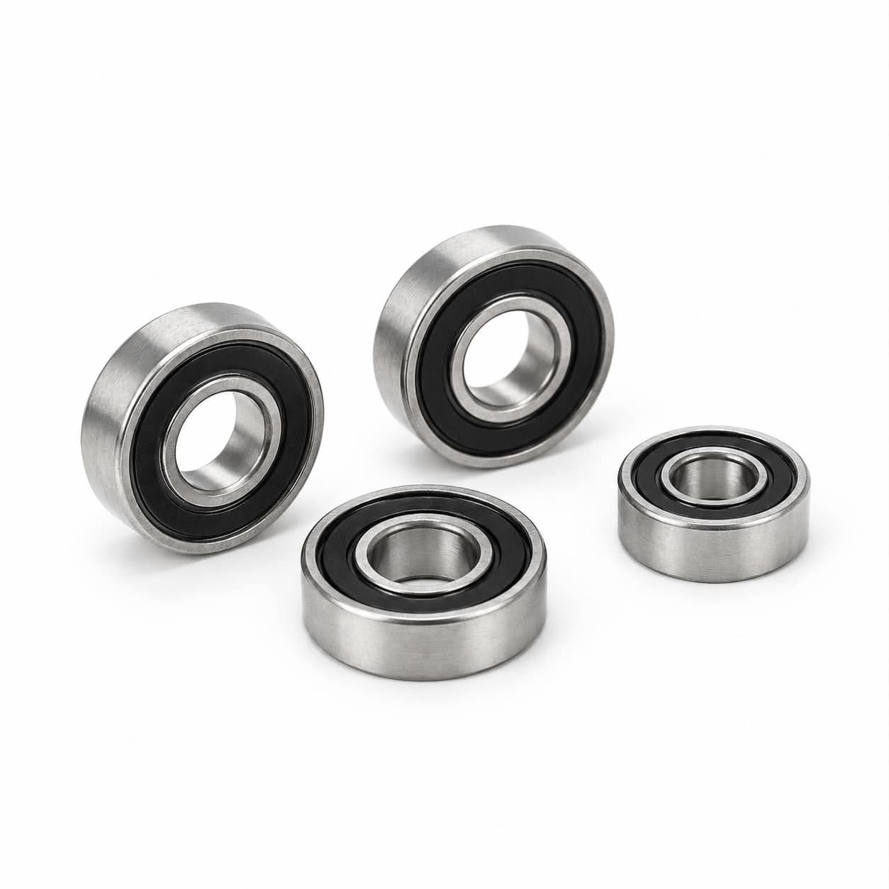 Four Spinsmith rubber-sealed precision ball bearings